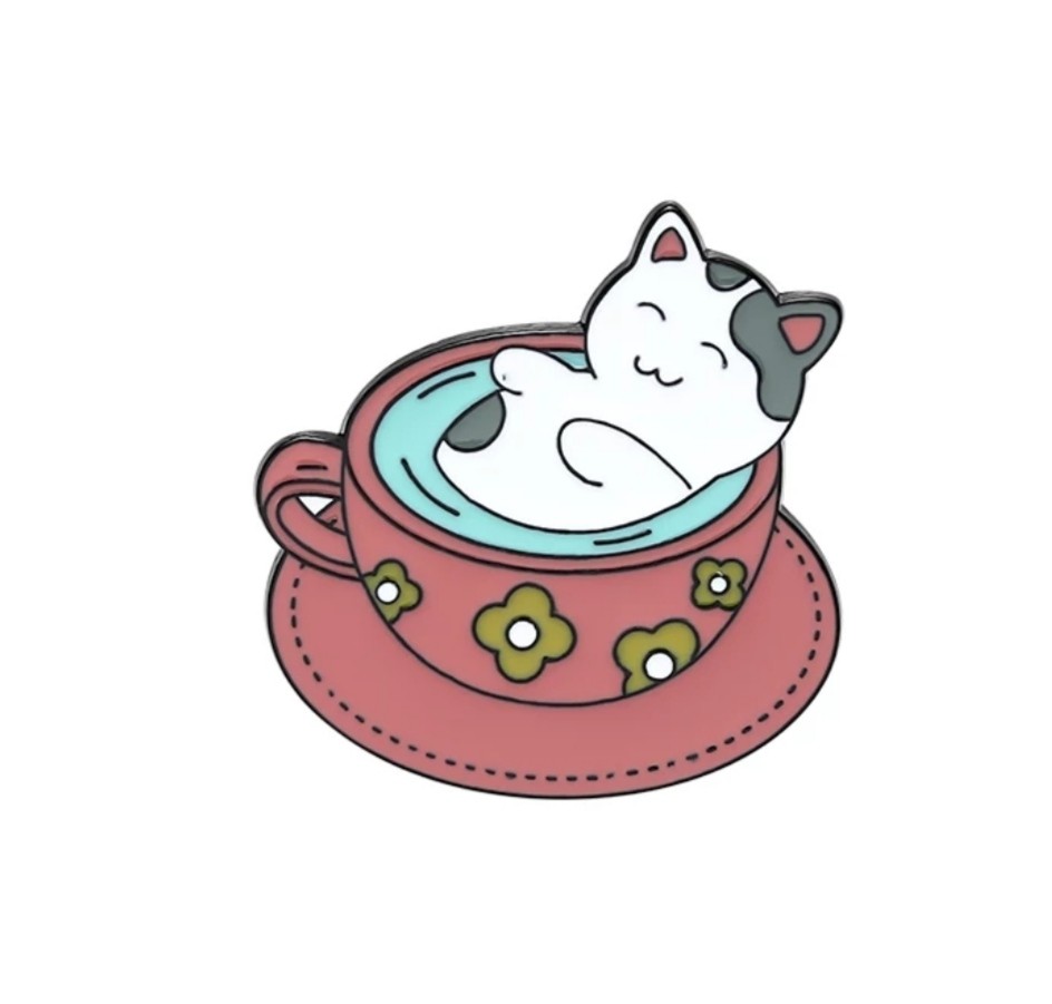 Imagen de pin gato en taza de té