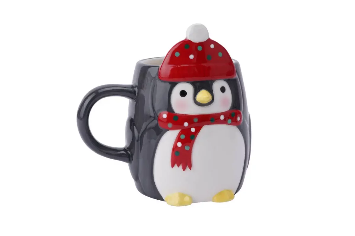 Imagen de taza navideña de pingüino