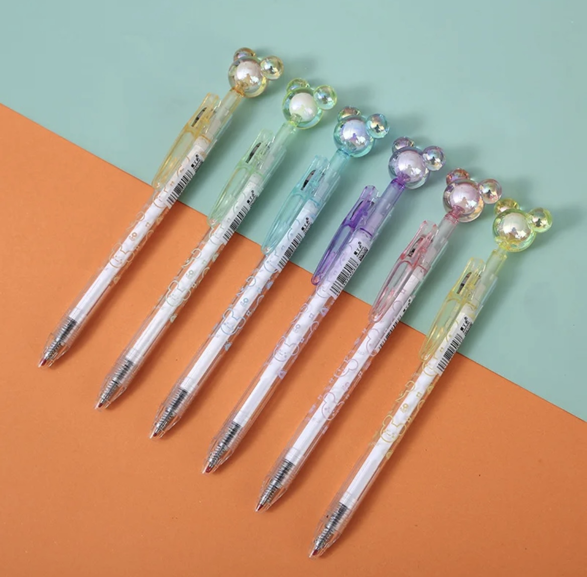Imagen de bolígrafos con cabeza de mickey mouse de cristal en morado, verde, amarillo, rosa, azul y naranja
