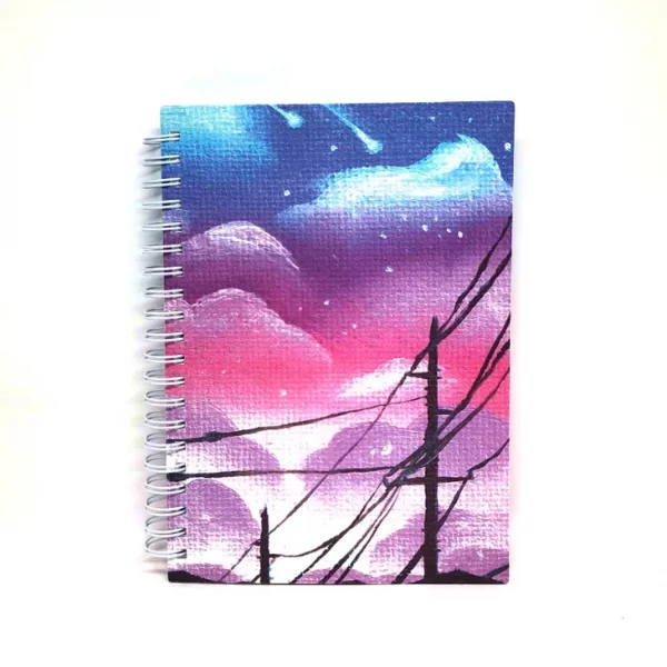 Imagen de libro de pegatinas reutilizable cielo en colores violetas
